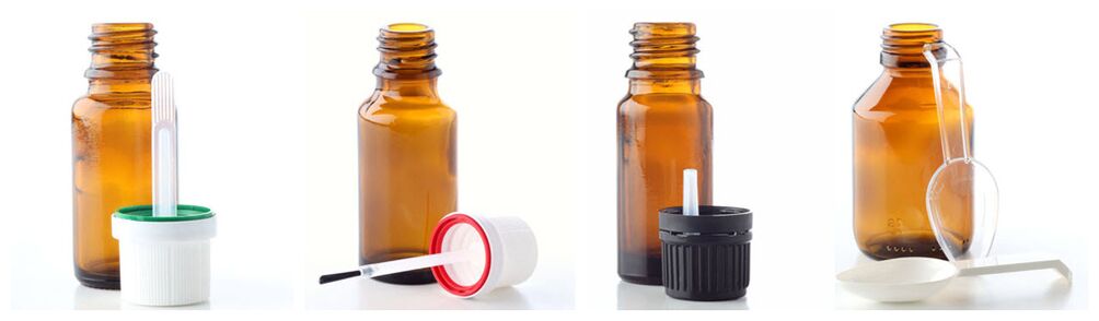 Pipette, brush, drip dispenser and measuring spoon complement glass bottles for essential oils